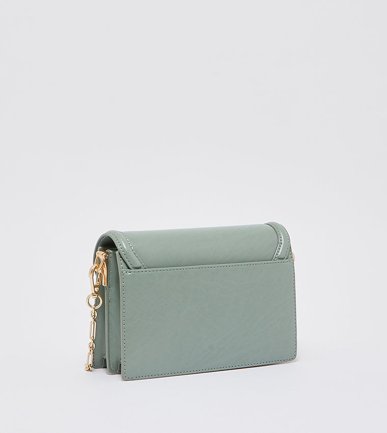 Genevieve metallic accent crossbody bag in sage green.