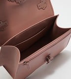 Meriah studded top handle bag in mauve