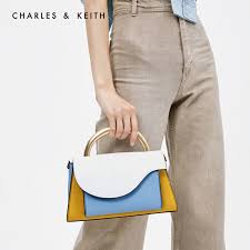 Angular Flap Metallic Top Handle Bag in a multi-color