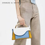 Angular Flap Metallic Top Handle Bag in a multi-color