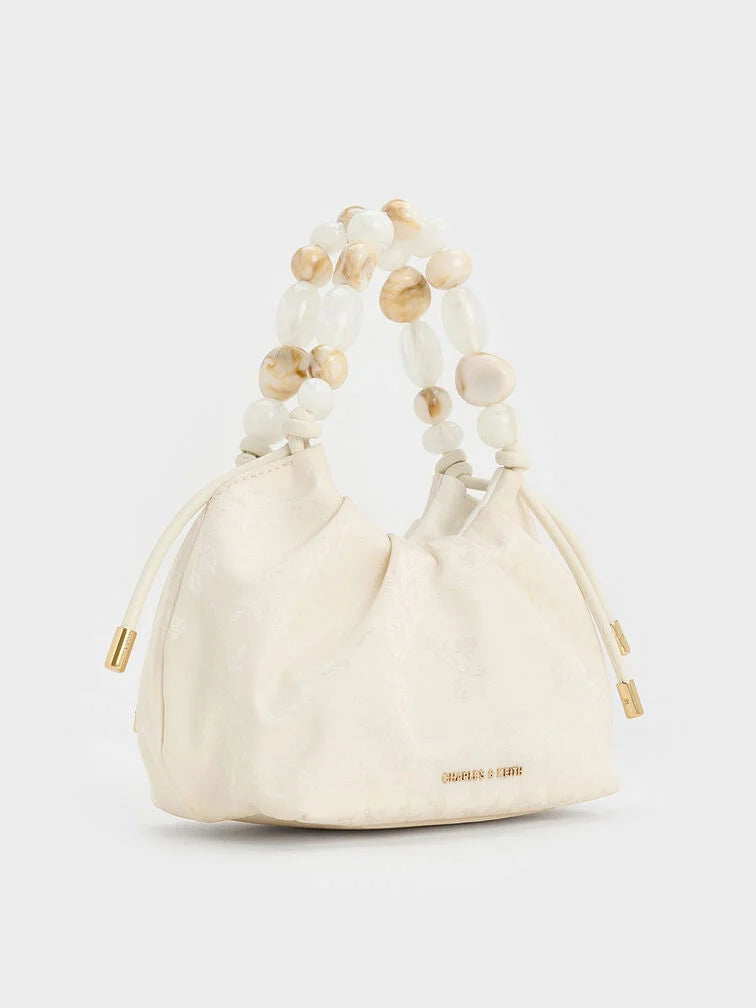 Aviary Beaded Acrylic Handle Slouchy Bag.