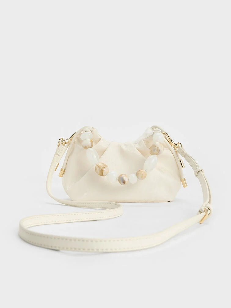 Aviary Beaded Acrylic Handle Slouchy Bag.