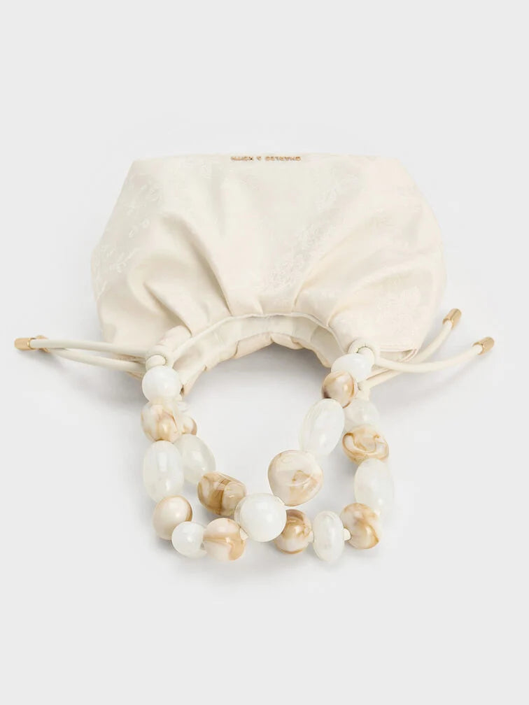 Aviary Beaded Acrylic Handle Slouchy Bag.