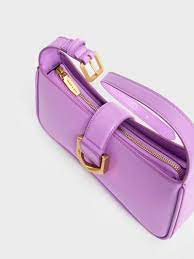 Gabine curved shoulder bag in violet faux leather
