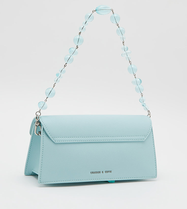 Sabrina checkered envelope shoulder bag in light blue.