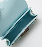 Sabrina checkered envelope shoulder bag in light blue.