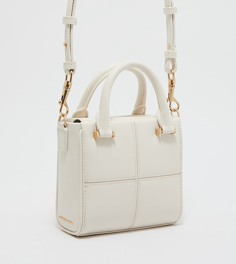 Textured Panelled Top Handle Bag.