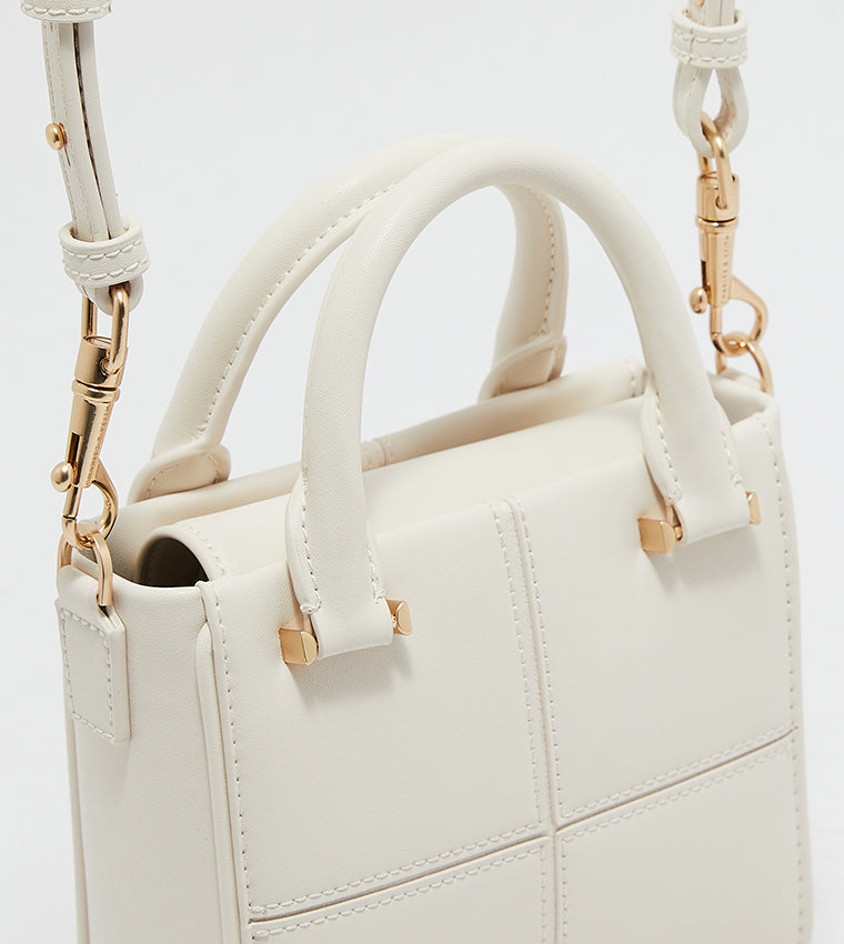 Textured Panelled Top Handle Bag.