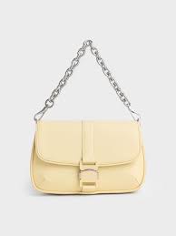 Zetta Belt Buckle Mini Bag in butter yellow