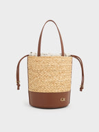 leather and raffia bucket bag