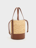 leather and raffia bucket bag