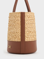 leather and raffia bucket bag