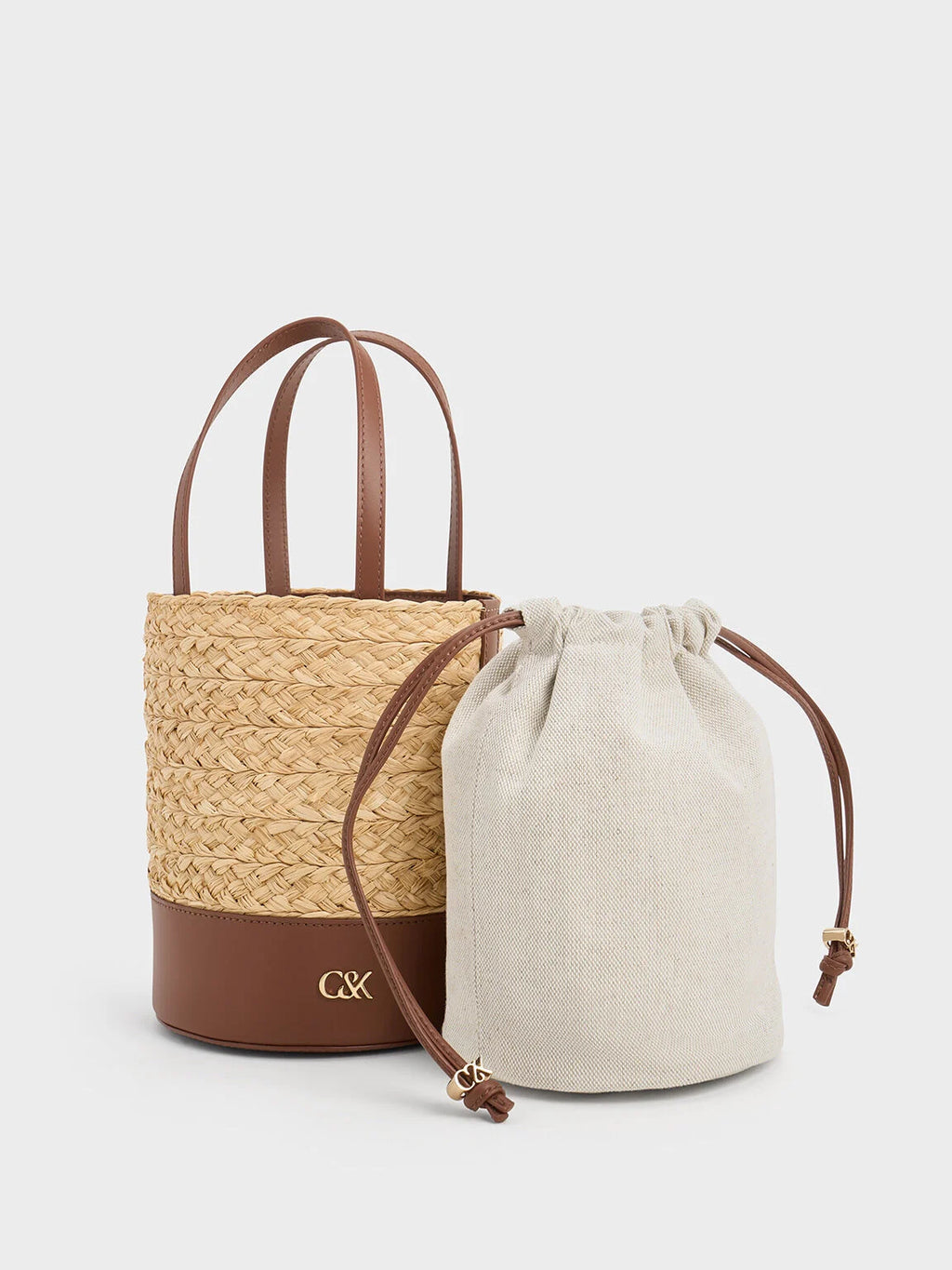 leather and raffia bucket bag