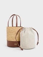 leather and raffia bucket bag