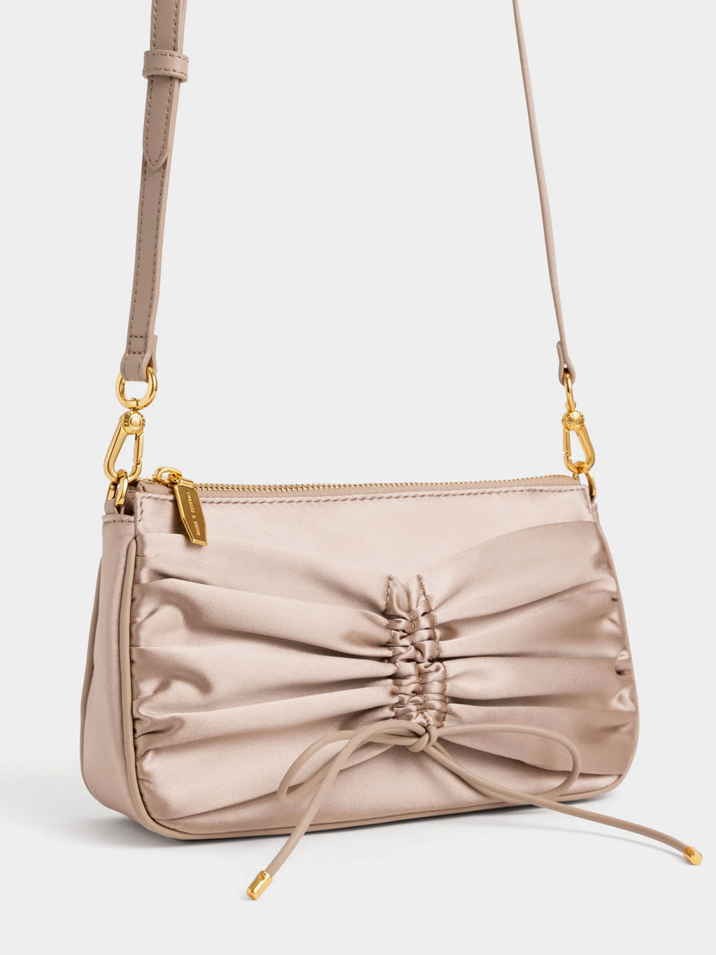 ruched mini shoulder bag with a faux pearl chain strap.